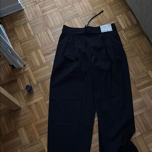 Uniqlo Black Dress Jumpsuit with Timeless Style